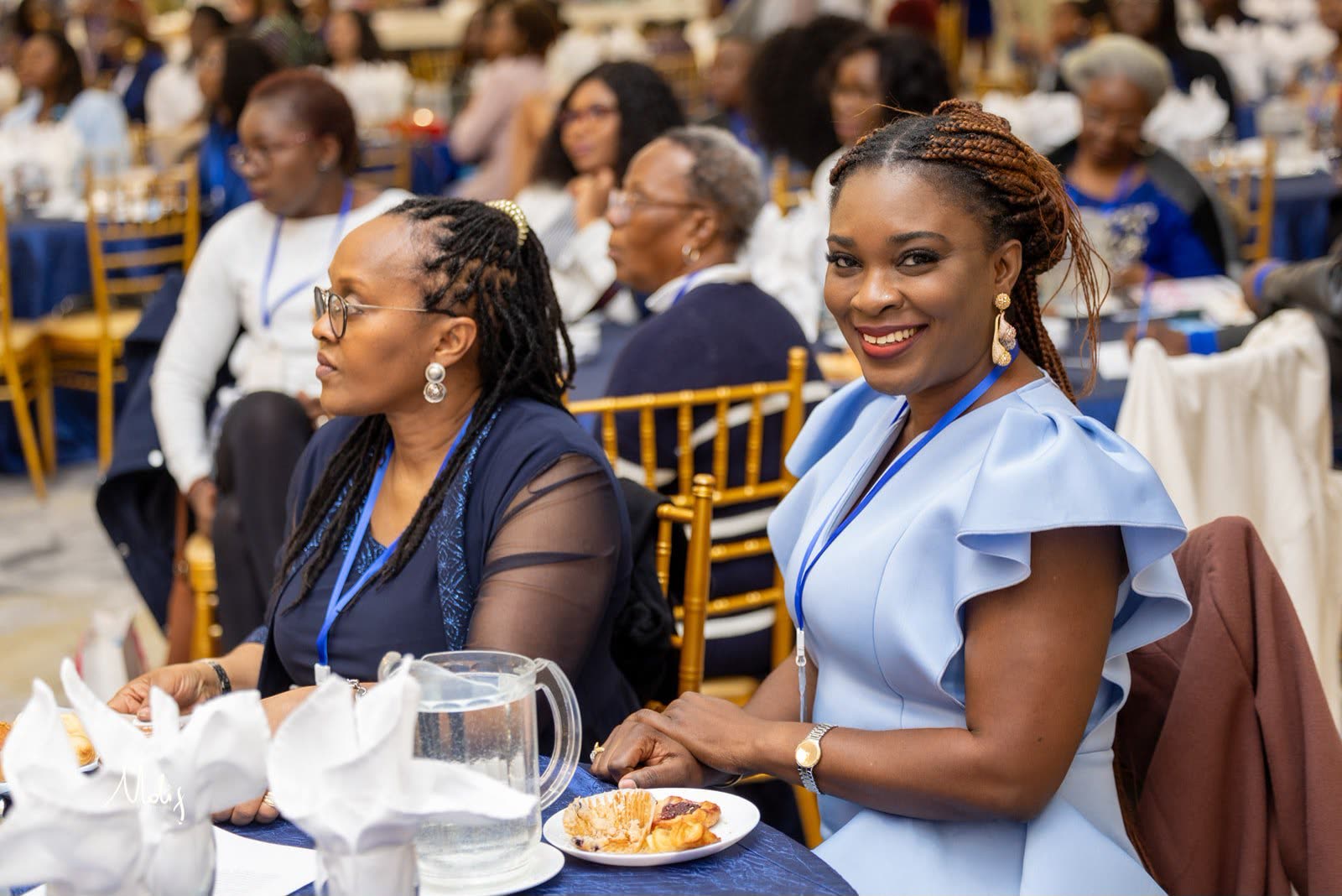 A smiling Academy member at a UYB event